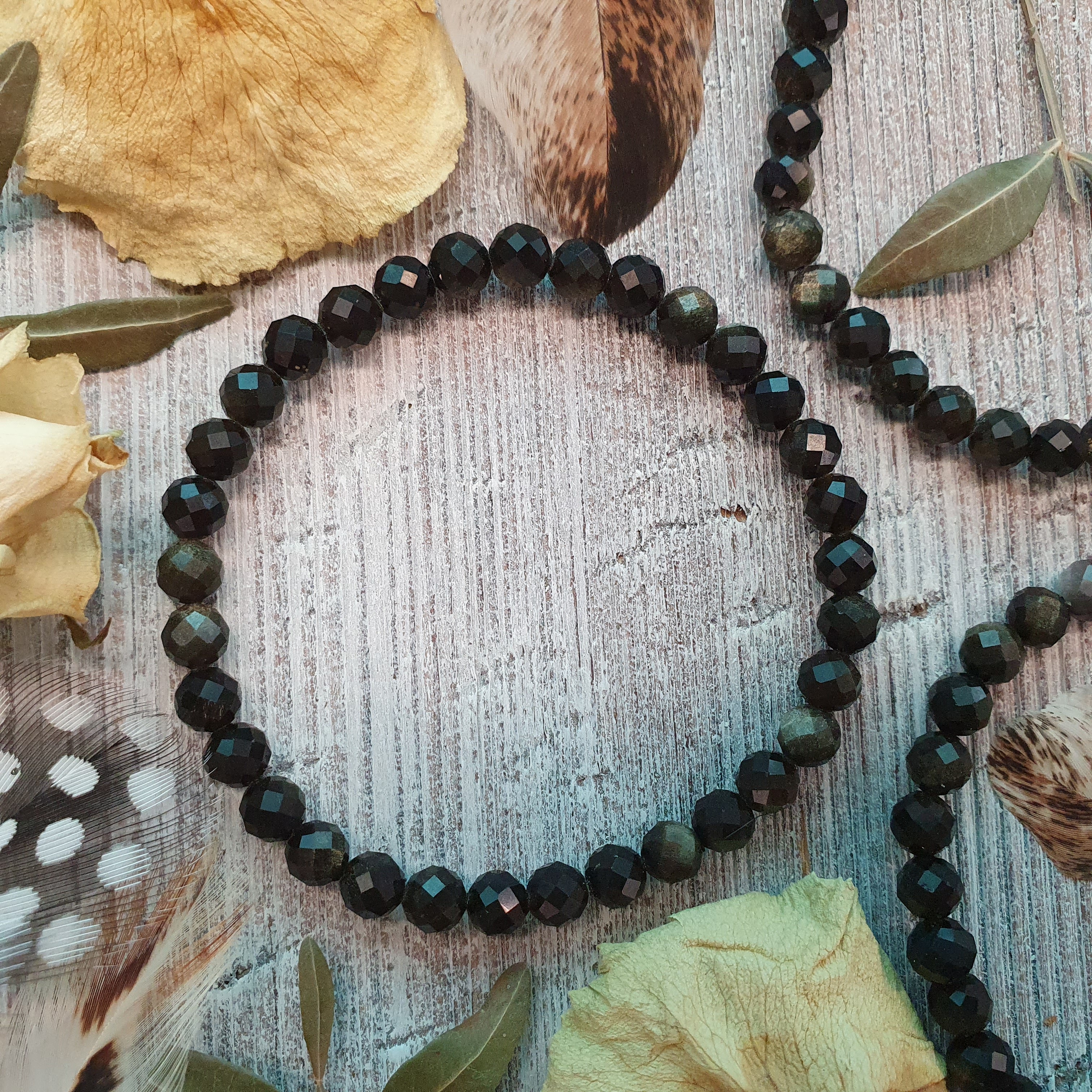 NÁRAMEK Z MINERÁLU OBSIDIÁN ZLATÝ FAZETOVANÝ 6 mm